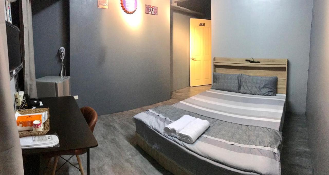 Hotel 曼橙驛站 à Dalin Extérieur photo