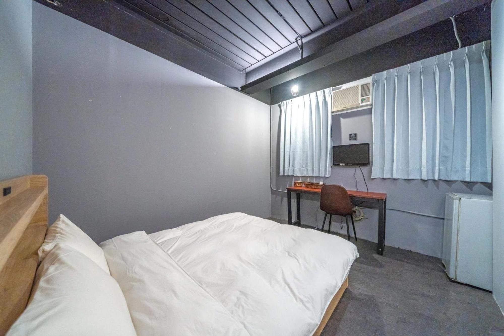 Hotel 曼橙驛站 à Dalin Chambre photo