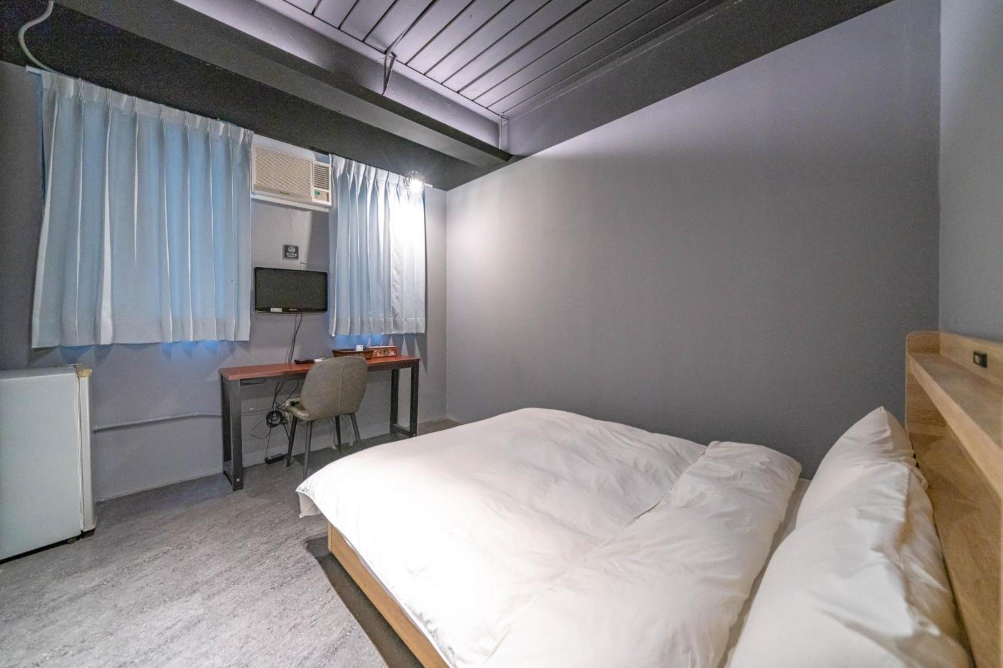 Hotel 曼橙驛站 à Dalin Chambre photo