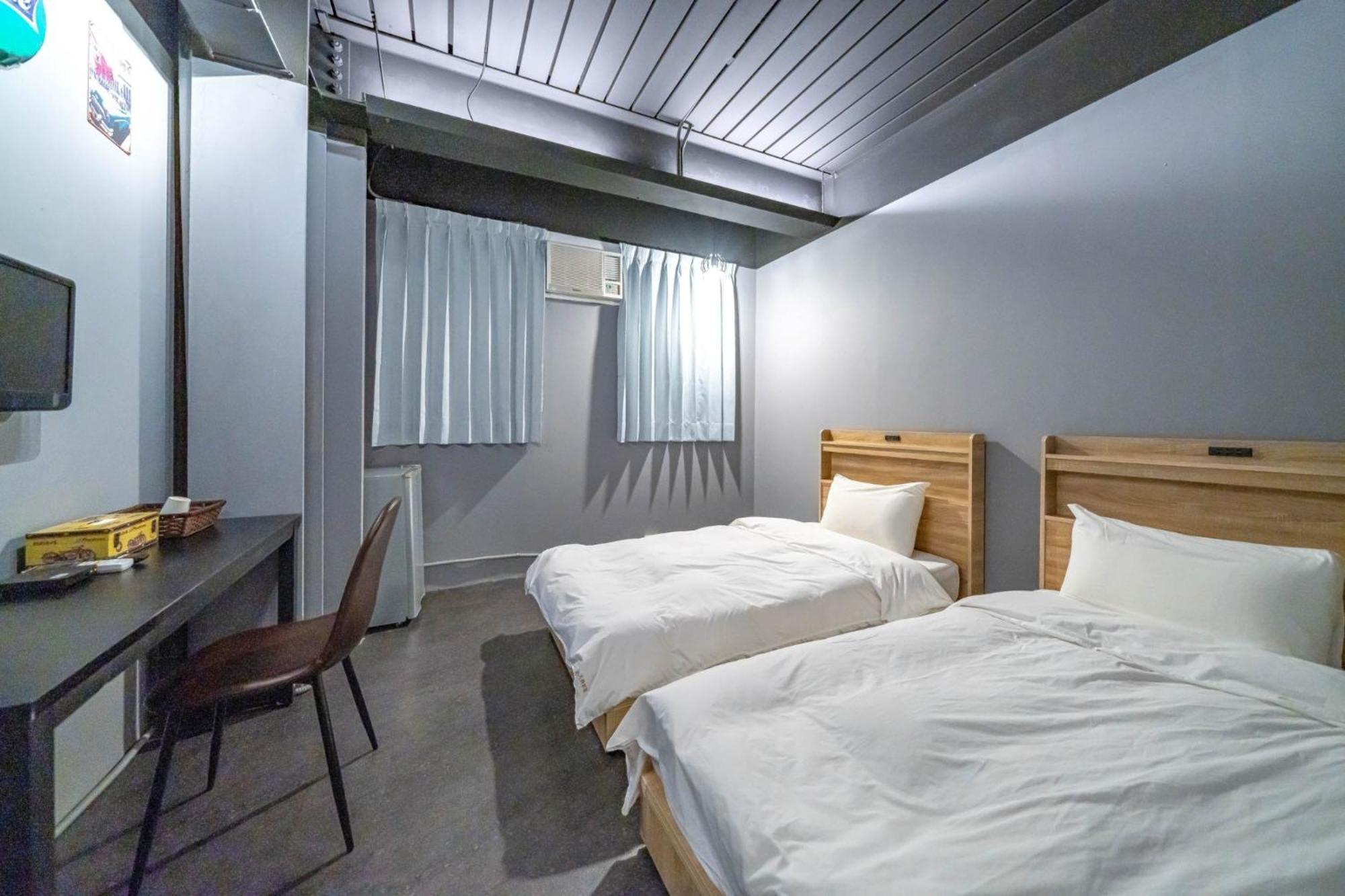 Hotel 曼橙驛站 à Dalin Chambre photo