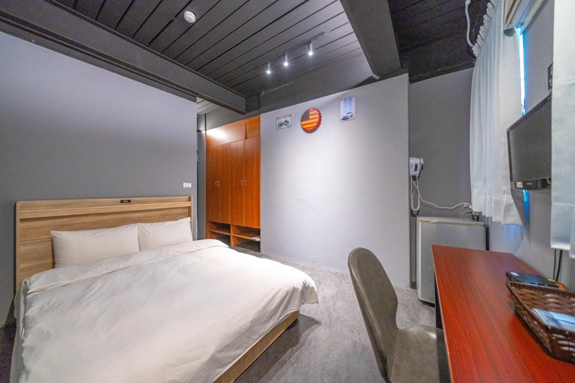 Hotel 曼橙驛站 à Dalin Chambre photo